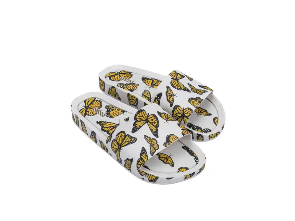 MELISSA BEACH SLIDE PRINT AD