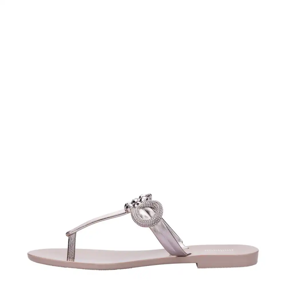 MELISSA HARMONIC T BAR GLEAM AD