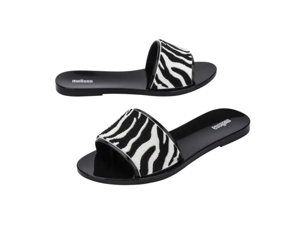 MELISSA SAVAGE SLIDE AD